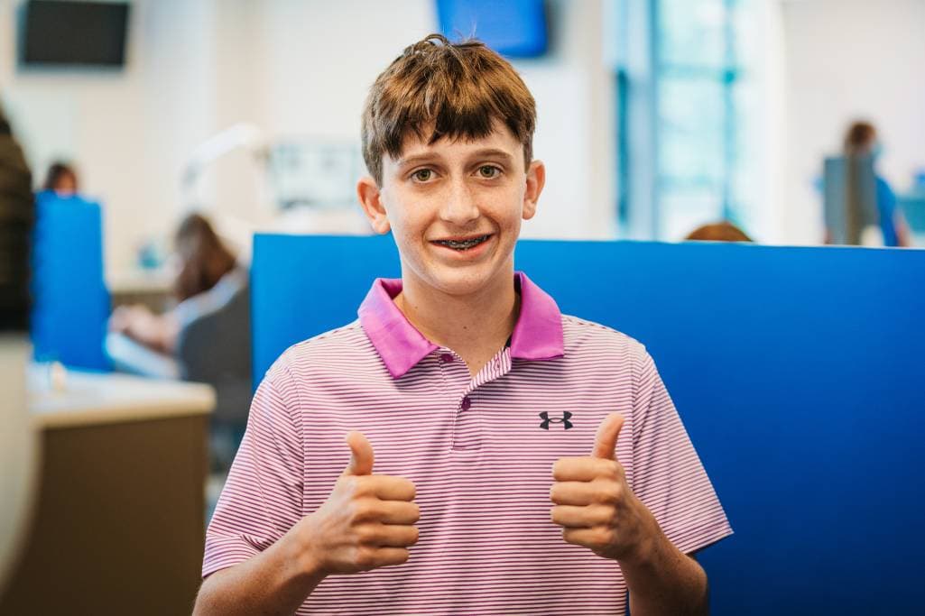 teen with braces